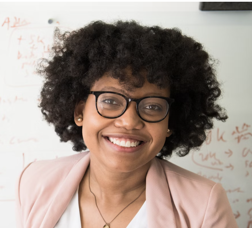 Smiling woman with curly hair