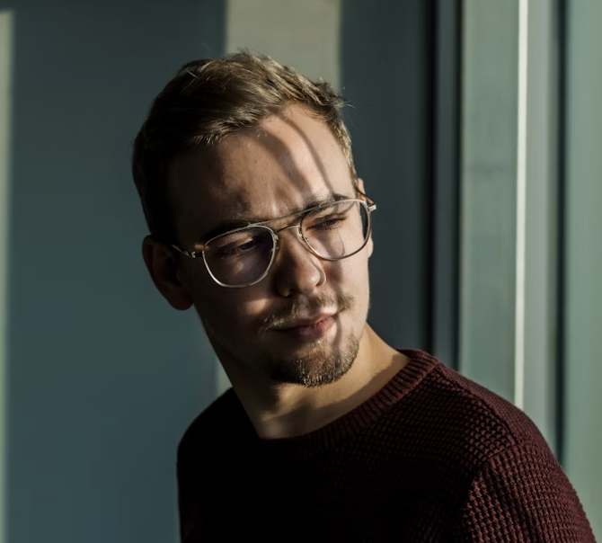 Man in glasses and sweater